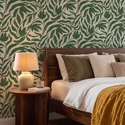 Green non-woven fabric with a leaf motif