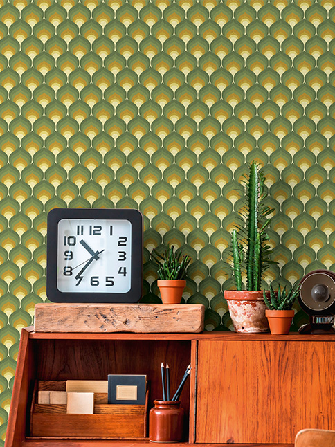 Green yellow retro wallpaper with a vintage alarm clock in the foreground