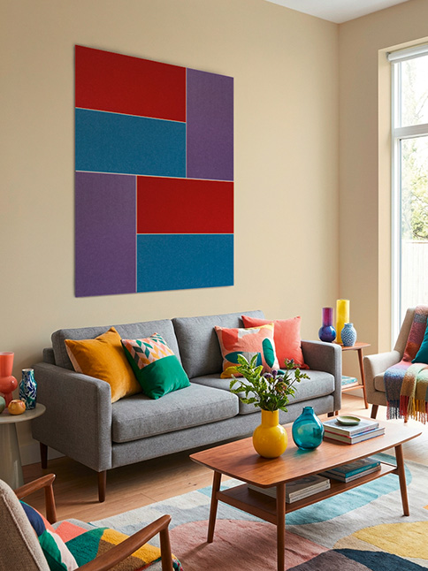 Felt panels on the wall behind the sofa