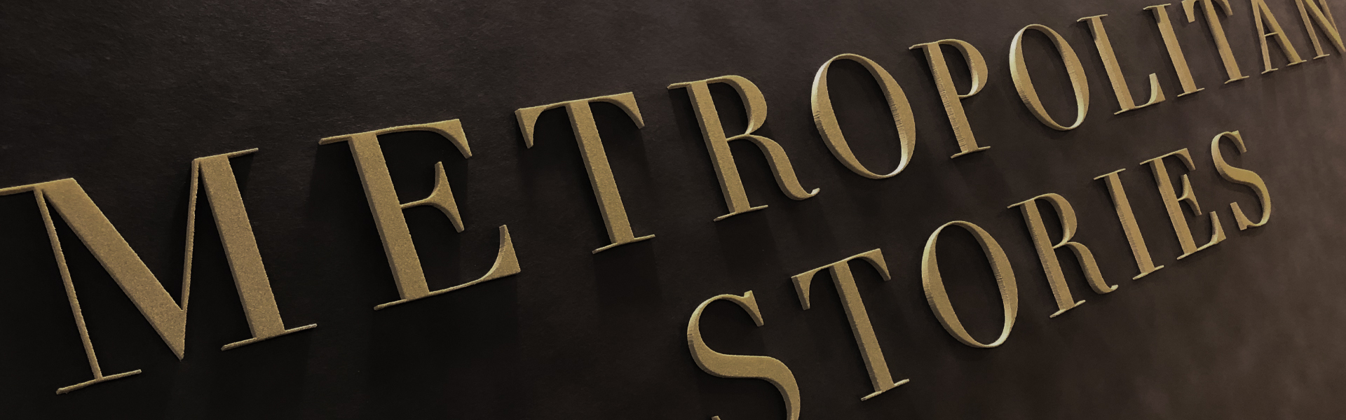 Schriftzug Metropolitan Stories - eine Marke der A.S. Création Tapeten AG